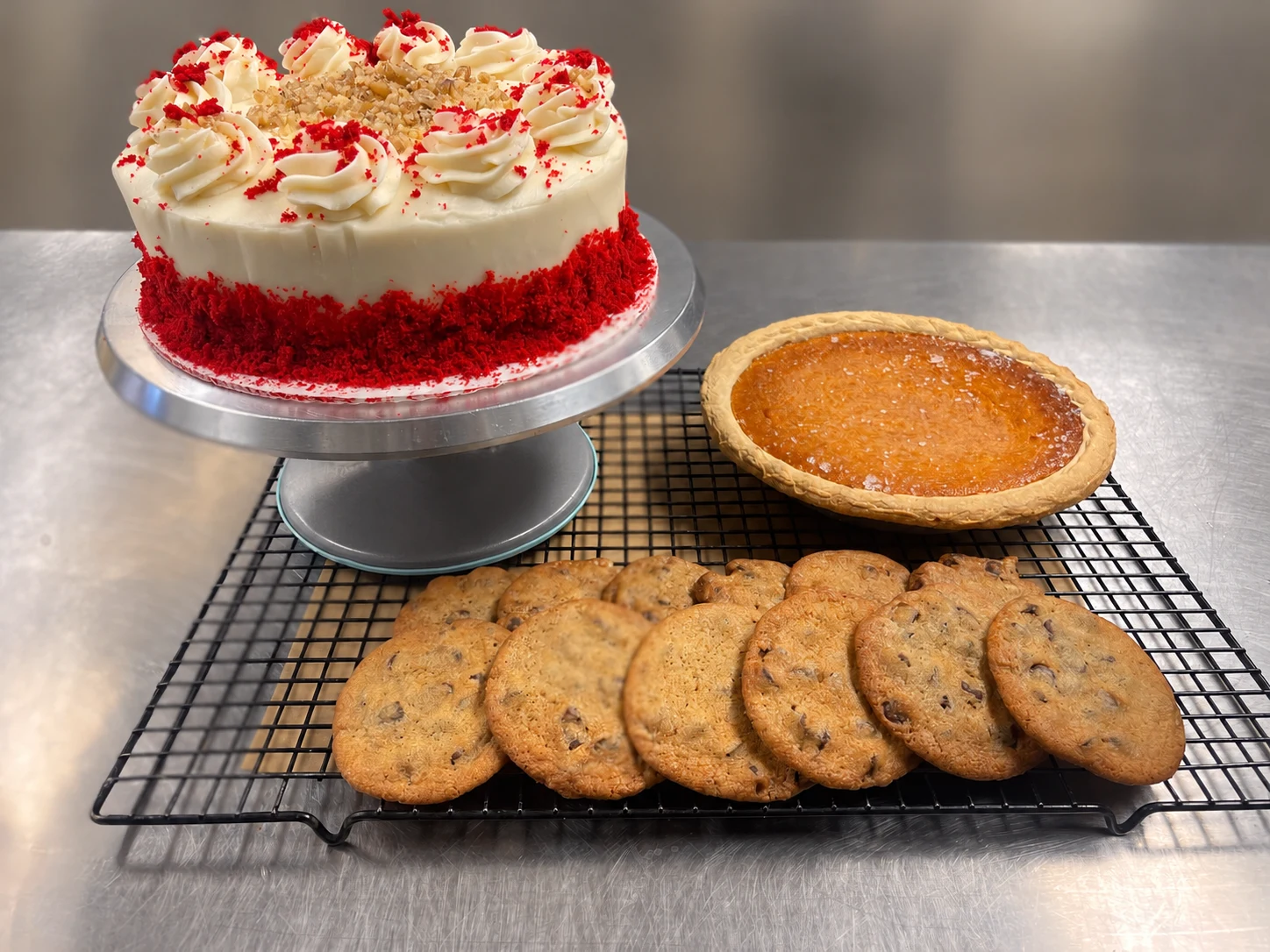 Red velvet cake with sweet potato pie and a dozen cookies